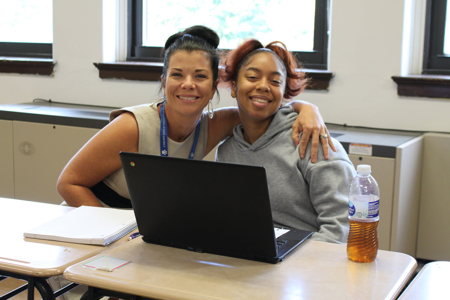 Jen Gorr, SJSCS principal, left; and Ariana Foote, who attends the high school program...